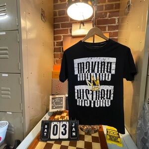 Making History" graphic t-shirt.